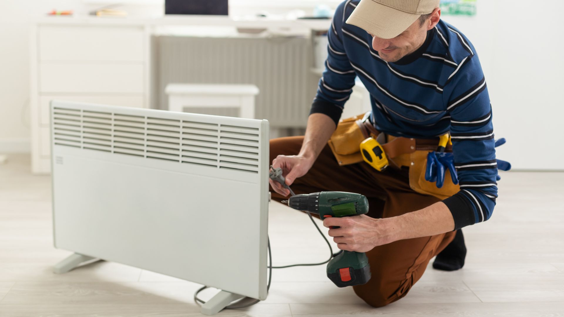 a man repairing a heating unit
